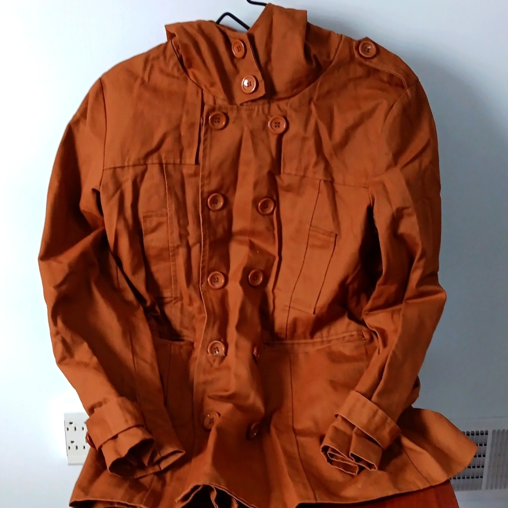 Light weight jacket with hood. Made by Whatlees size Men's medium
